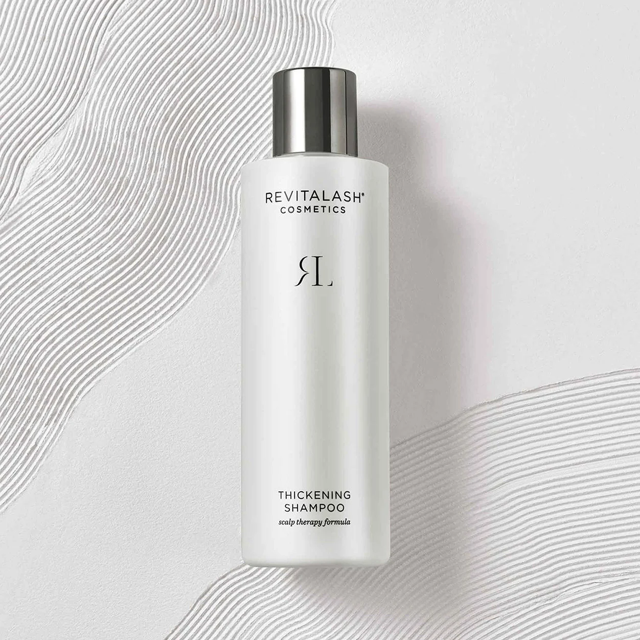 شامپو ضخیم‌کننده و حجم‌دهنده مو رویتالش RevitaLash Cosmetics Thickening Shampoo